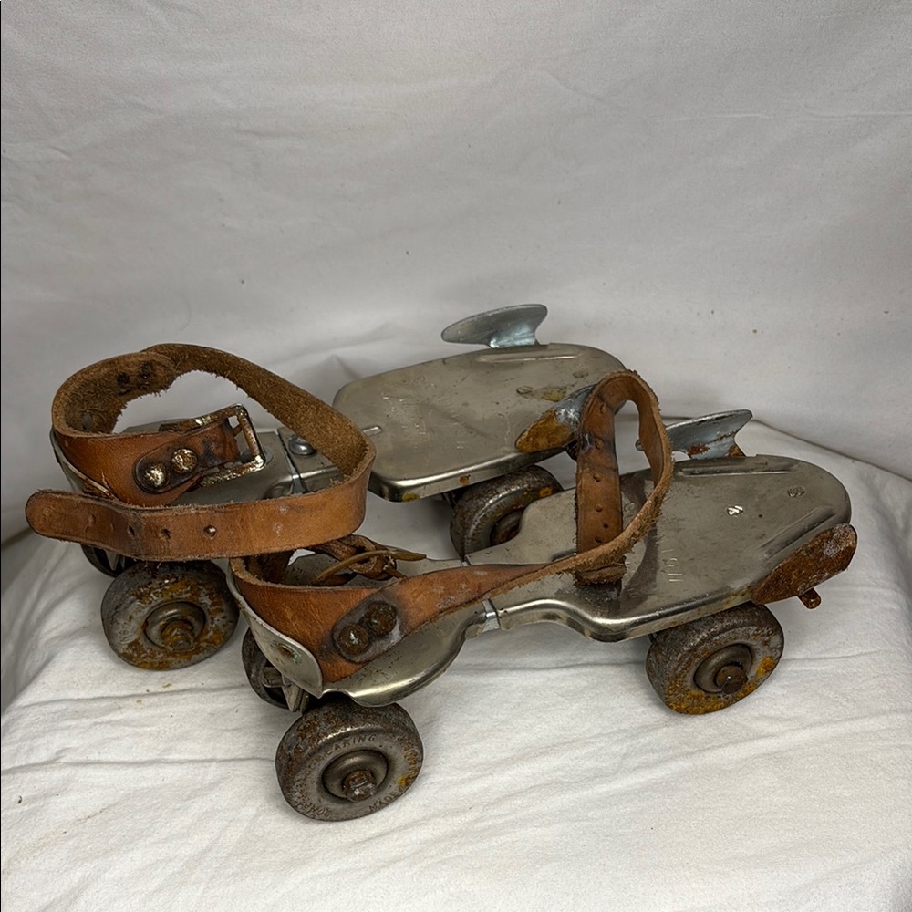 Vintage Metal Roller Skates with Brown leather Straps